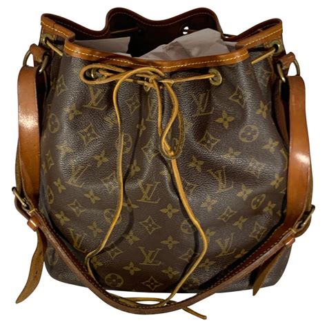 louis vuitton white bucket bag|louis vuitton drawstring bucket bag.